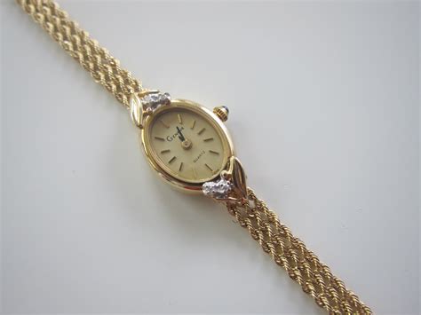 versace style round gold dial diamond gold bracelet watch